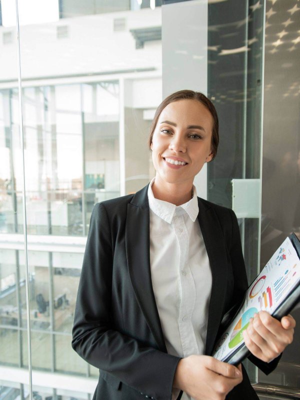 beautiful-woman-with-graph-papers-2025-03-15-15-25-12-utc