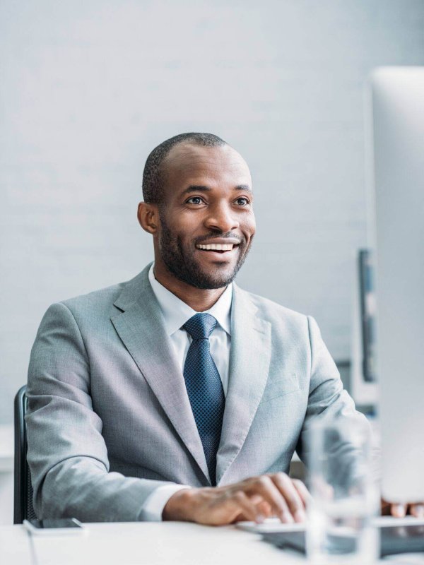 portrait-of-smiling-african-american-businessman-w-2024-11-18-10-23-22-utc