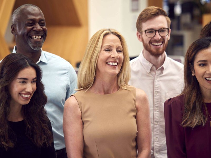 portrait-of-smiling-multi-cultural-business-team-s-2024-10-19-07-34-36-utc