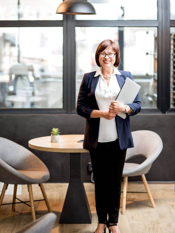 senior-business-woman-portrait-indoors-2025-03-13-03-54-37-utc