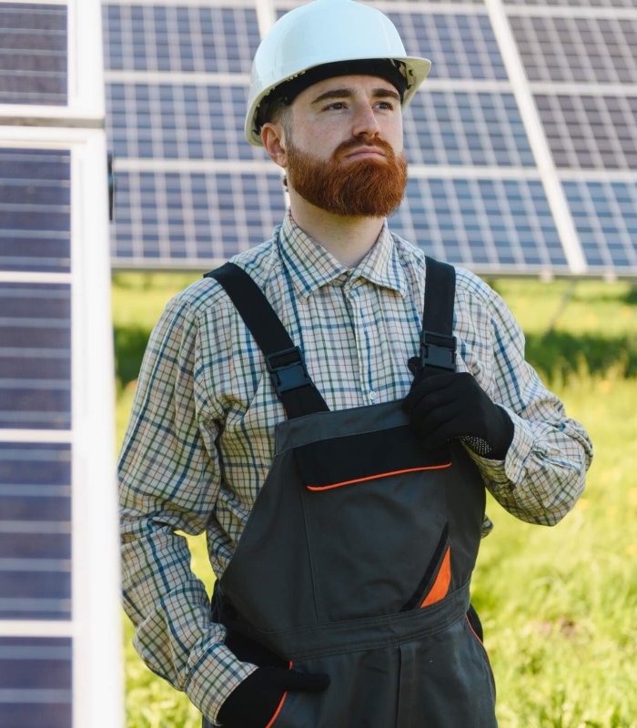 Skilled technician installing solar panels for renewable energy