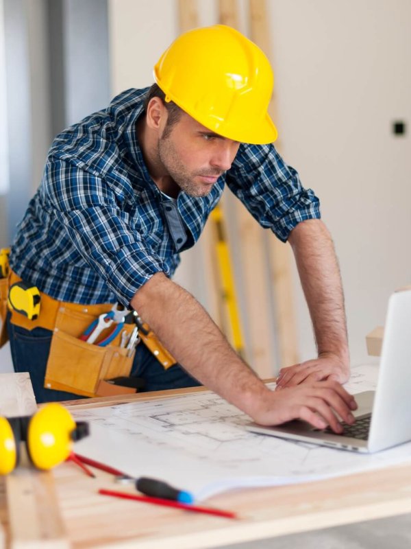 Portrait of hard working building contractor