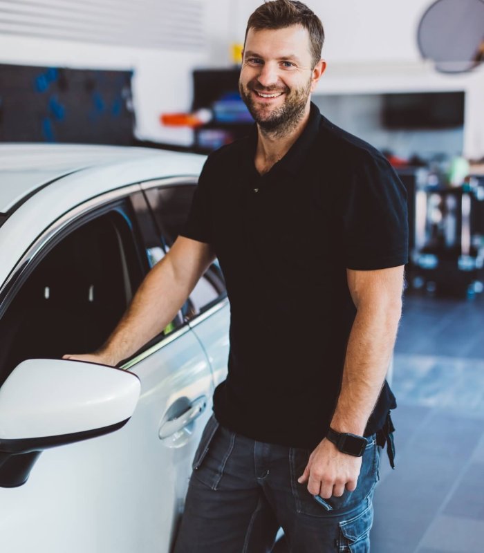 Car mechanic in workshop