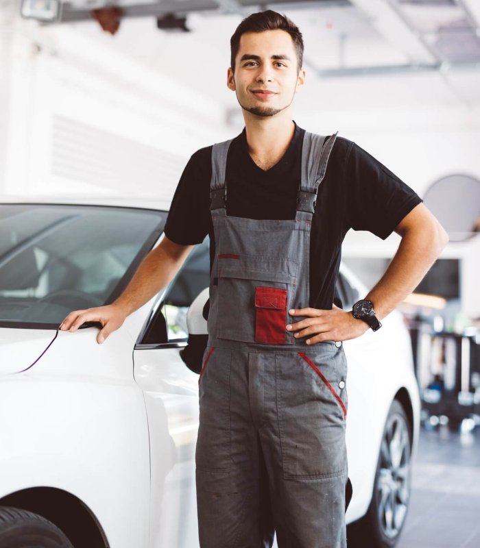 Car mechanic in workshop