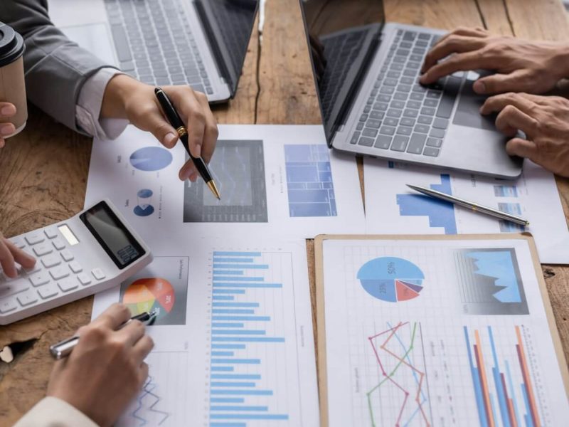 financial-analysts-analyze-business-financial-reports-on-digital-tablet-planning-investment-project