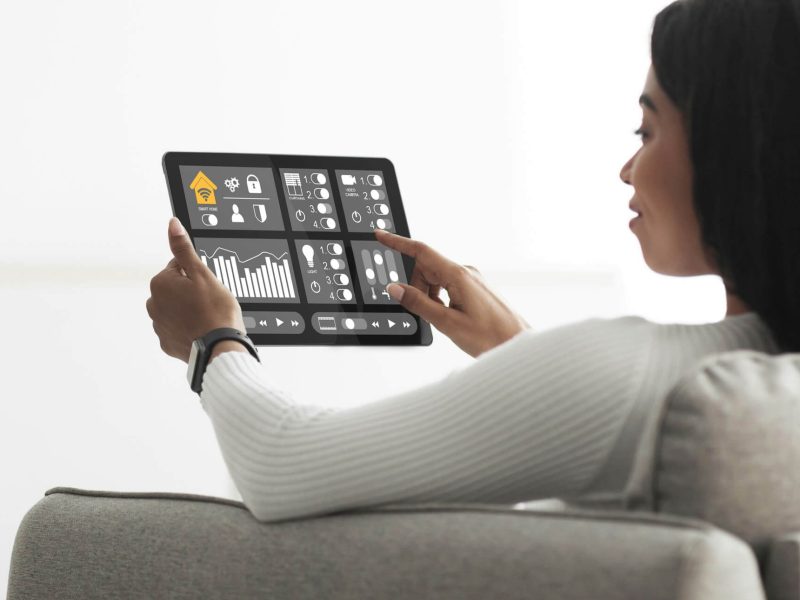 african-american-woman-using-smart-home-automation-assistant