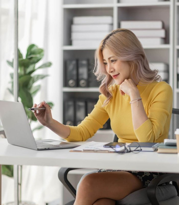 Young Asian business creative business womsn coworker in office Happy to be successful partnership t