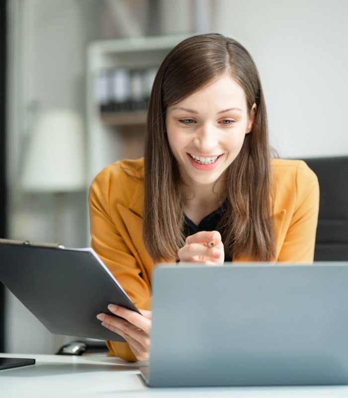 Business woman using digital tablet with calendar planner and organizer to plan and reminder